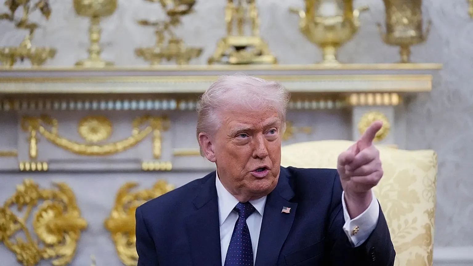 President Donald Trump speaks about U.S. strikes on Iran and escalating Middle East conflict during a meeting.