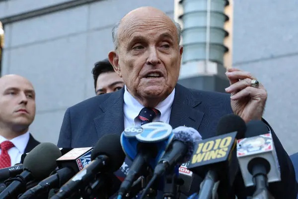Rudy Giuliani speaking at a public event prior to hospitalization in Florida.